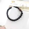 Nuevo estilo trenza trenzada cuerda gruesa para el pelo simple todo-partido alta elasticidad pequeña cubierta de cuero goma para el pelo accesorios para el pelo de Corea del Sur cubierta de cuero
