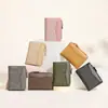 Nueva cartera coreana Yueqiankai con múltiples ranuras para tarjetas y cremallera, 80% de descuento, acabado mate y diseño de retazos, alto atractivo estético para niñas