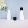 En stock botella cónica blanca de espuma de 60 ml, botella espumadora de PET para mousse de 100 ml, dispensador portátil de espuma facial