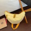Outono 2026 Nova Bolsa de Ombro Única Elegante Personalidade Moderna Design de Nicho Textura Simples Casual Bolsa Transversal Dumpling