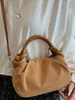 Bolso pequeño cuadrado de color liso estilo coreano para mujer, nuevo diseño 2026 casual y apto para el trabajo, bolso de hombro o bandolera simple y retro