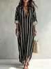 Vestido shirt de mulher plus size com listras verticais, gola de lapela, mangas caídas, corte solto, estilo casual para férias na praia