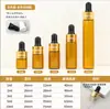 En stock al por mayor transparente botella cuentagotas de 3 ml marrón 5 ml líquido de esencia botella pequeña de aceite esencial botella de perfume dividida en botellas