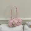 Nova bolsa de ombro feminina estilo coreano com laço, bolsa Boston, textura estilo floresta 2026, bolsa de axila nicho moderna