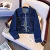 Chaqueta corta de mezclilla azul oscuro para mujer, nuevo estilo primavera y otoño 2026, popular este año, top chaqueta casual holgado