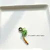 Precio mayorista directo de fábrica pulsera hecha a mano pulsera con colgante diy accesorios pequeños deslizantes colgante de garra de gato lindo Joker