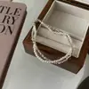 Dulce Collar de Perlas de Doble Capa con Plata Rota Enroscada para Mujer Elegante Retro Lujo Ligero Gama Alta Estilo Fresco Pulsera Pulsera