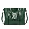 2023 nuevo bolso de moda europeo y americano para mujer bolso tote de cuero encerado de moda bolso de hombro simple para mujer una generación de pelo
