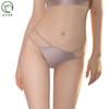 La tentación del deseo sexy encantador transfronterizo micro tanga para mujer brillante al aceite multicolor elástico transpirable