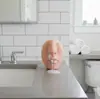 Dispensador de jabón de pared con forma de nariz realista