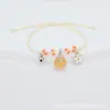 Bestseller transfronterizo: flores reales, flores secas, gypsophila, pulseras tejidas hechas a mano, joyería de cerámica de Jingdezhen, estilos de puestos en lugares escénicos