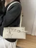 Otoño 2026 Nuevo Estilo Coreano Nicho Bolso de Motocicleta Versátil para Viajes Diarios Bolso de Mano Bolso de Hombro Cruzado de Moda al por Mayor Bolso para Mujer