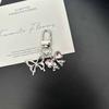 Colgante de llavero con forma de corazón de melocotón y mariposa de diamante rosa de alto valor, corazón de chica dulce, flor pequeña, mariposa, accesorios para mochila escolar de estudiante