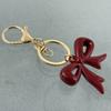 Accesorios para llavero Accesorios de regalo creativos Colgante de lazo rojo vintage Colgante para colgar en el bolso Rojo angora Niña