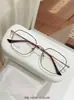 Gafas de vista de negocio para mujer de titanio medio, montura completa ultraligera, gafas Danyang, montura de gafas de moda nueva y moderna