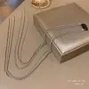 Estilo Li Qin Corrente de cabelo trançada com pérolas feminina Redes sociais Temperamento 2023 Novo Headdress de alto padrão Acessórios de cabelo Fita Artefato