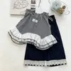 Conjunto de Verão Feminino Preto e Branco Xadrez Patchwork Malha Sem Mangas 2026 Novo Acabamento em Renda Calça Wide-Leg Conjunto de Duas Peças