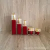 Acrílico 50ml botella secundaria de crema loción roja traje cabezal de bomba de loción de doble capa material de empaque cosmético