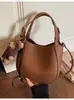 Bolsa Pequena Coreana Retro Transfronteiriça para Mulheres Nova Moda Primavera 2026 Versátil Bolsa Transversal Super Popular Bolsa de Mão Estilo Balde