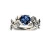 Deseo una venta caliente nuevo anillo de compromiso de hoja de olivo de princesa europea y americana anillo de diamante de circón azul joyería al por mayor