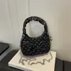 Bolso de mano informal de moda coreana, simple, con lunares, nuevo 2026, nicho, bandolera versátil y elegante para mujer