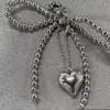 Nuevo Colgante de Corazón Plateado con Lazo Dulce de Perla Coreano Llavero de Coche Accesorios Colgantes para Teléfono Móvil Auriculares
