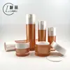 Fondo Estampado Botella Redonda Botella Acrílica Botella con Dispensador Naranja Botella para Esencia de Loción Botella para Crema Material de Empaque para Set de Cosméticos