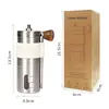 Fábrica de origen en stock pequeño molinillo de cerámica de manivela manual molinillo de café de acero inoxidable molinillo manual de granos de café