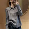 Camisa gris de manga larga para mujer, diseño francés estilo coreano, adecuada para ir al trabajo, con un ambiente único y elegante, nuevo top versátil primavera/otoño 2026