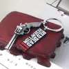 Red Dead Redemption 2 Pistola de Primo Grande Letrero de Carta Llavero Colgante Colgante de Redención Muerto