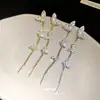 Pendientes de borla de flor de circón con aguja plateada ultrabrillante de lujo ligero, diseño de moda, pendientes de nicho, pendientes de alta gama de lujo ligero
