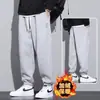 Venda Direta da Fábrica Calças Casuais Masculinas Calças de Moletom Elásticas com Punho Estação Primavera e Outono Estilo Grosso Soltas Tamanho Plus Calças Esportivas Versáteis