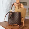Bolso tipo cubo versátil de alta gama con estampado retro para mujer, modelo nuevo 2026, de alto valor, lujo ligero, para el trabajo, de hombro, cruzado
