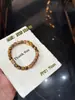 Humu WangchuanAgarwood Natural OriginalOjo de Tigre AmarilloPulsera Otoñal RetroEstilo Elegante de TemperamentoVersátil y de Moda