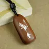 Colgante Taoísta de Madera de Azufaifo Incrustada con Plata Colgante de Mantra de Nueve Caracteres con Incrustaciones de Madera Morada Llavero Adorno de Zhao Gongming Venta al por Mayor Personalizada