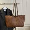 Bolso vintage de gran capacidad para mujer, novedad de 2025, bolso de hombro informal de piel suave, bolso de mano personalizado, bolso de viaje de corta distancia.
