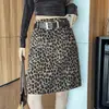 Falda corta de leopardo de tiro real para mujer, nuevo estilo otoño 2026, cintura alta, cubre caderas, adelgazante, línea A, ajustada, falda de longitud media