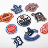 Ya bordado nuevo logo de equipo de baloncesto pegatinas bordadas por computadora pegatinas decorativas para ropa bolsa parches para zapatos y sombreros pegatinas de letras de hoja de arce