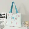 Bolsa de lona suave y linda estilo coreano con patrones en relieve, diseñada para niñas, con un diseño de doble capa y engrosado, gran capacidad y adecuada para la escuela y los desplazamientos.