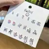 Versión Coreana Transfronteriza 9 Pares de Juegos de Pendientes con Tarjetas, Pendientes Lindos de Aleación con Pedrería de Vidrio en Forma de Corazón y Lazo Modernos