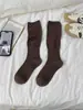 Calcetines de lana holgados para otoño e invierno para mujer, calcetines de lana lisa para pantorrilla, calcetines largos de tubo grises, suaves y versátiles para mujer