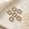 Exquisito colgante de trébol de cuatro hojas incrustado con diamantes, accesorio para collar o pulsera DIY, piezas de joyería directamente del fabricante, disponible para pedidos mixtos y ventas transfronterizas