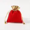 Bolsa de terciopelo dorado con cordón doble para embalaje de joyas, bolsa de regalo de terciopelo dorado apilada.