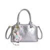 Bolsa Pequena Quadrada Texturizada Estilo Japonês e Coreano para Mulheres 2026 Nova Bolsa de Ombro Transversal de Nicho Estilo Creme Bolsa Feminina Fofa