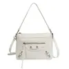 Bolso de mujer de alta gama, nuevo para la primavera de 2026, bolso de axila para el trabajo, bolso de hombro cruzado con diseño de nicho, moderno y simple