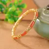 Pulseira estilo nacional Yilu prata água vermelha natural S925 prata de lei seção de laço oca pulseira de elevação joias de prata fábrica