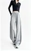 Colección de otoño/invierno transfronteriza de Amazon: Pantalones deportivos de tiro alto, con franjas laterales asimétricas, bloques de color y una ligera curva, disponibles para mujer y personalizables