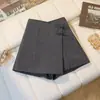 Nuevos pantalones-falda de estilo chino con lazo para mujer, verano anti-exposición, pantalones-falda cortos irregulares de cintura alta en línea A adelgazantes