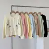 Cardigan jacket de punto bordado floral estilo coreano para otoño e invierno, nuevo, de cuello redondo, tejido tipo toalla, suéter de diseño versátil y suave para mujer
