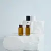 Ponto 1Ml2Ml3Ml5Ml Marrom Creme para Massagem para Olhos Frasco com Rolo Amostra de Óleo Essencial Sub-frasco de Perfume Portátil para Viagem